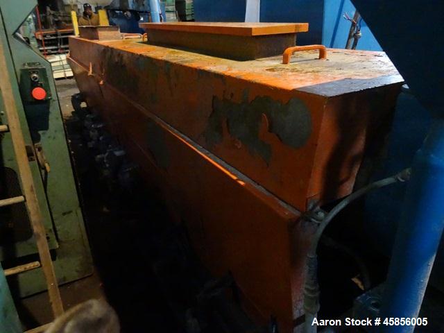 Used 6" Deltaplast extruder, 32 to 1 L/D ratio. Electrically heated, water cooled, jacketed feed section, thru Hamilton gearbox with 17.75 to 1 gearbox ratio, 300 hp DC motor with SCR controller, mai...
