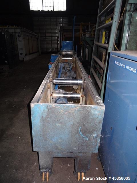 Used 6" Deltaplast extruder, 32 to 1 L/D ratio. Electrically heated, water cooled, jacketed feed section, thru Hamilton gearbox with 17.75 to 1 gearbox ratio, 300 hp DC motor with SCR controller, mai...