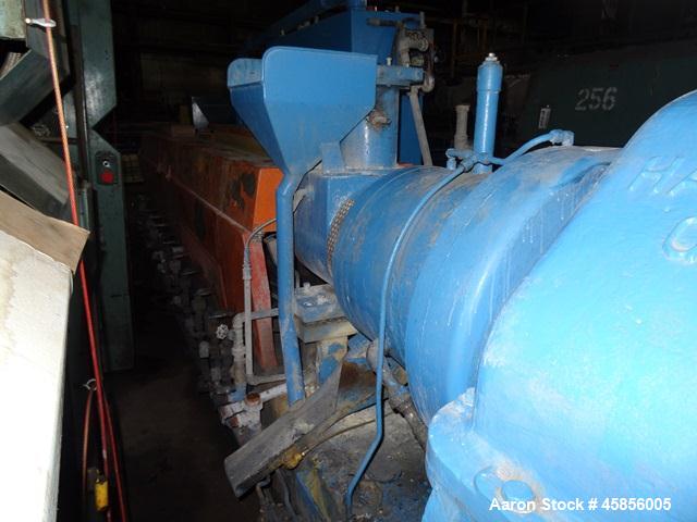 Used 6" Deltaplast extruder, 32 to 1 L/D ratio. Electrically heated, water cooled, jacketed feed section, thru Hamilton gearbox with 17.75 to 1 gearbox ratio, 300 hp DC motor with SCR controller, mai...