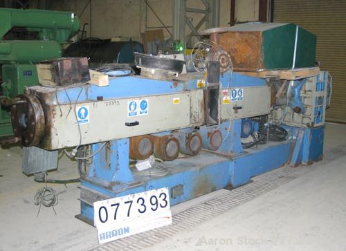 Used Dolci single screw extruder, model 120KR, 4.5" diameter screw x 160" long, 35:1 L/D ratio, 44" center line, 5 zone barrel, electrically heated, fan cooled, 8" diameter feed throat, side vented b...