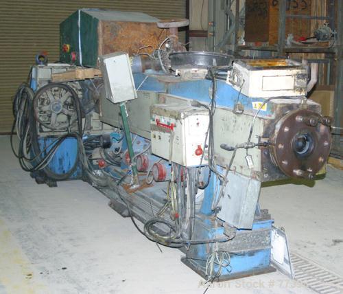 Used Dolci single screw extruder, model 120KR, 4.5" diameter screw x 160" long, 35:1 L/D ratio, 44" center line, 5 zone barrel, electrically heated, fan cooled, 8" diameter feed throat, side vented b...