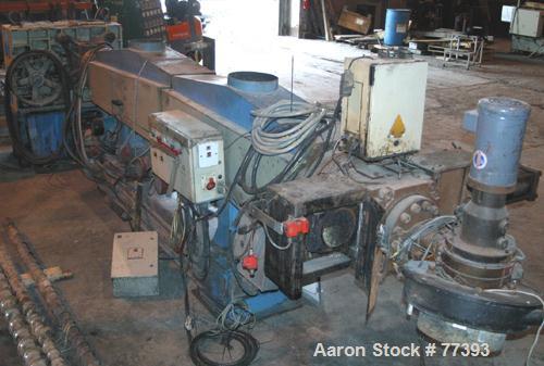 Used Dolci single screw extruder, model 120KR, 4.5" diameter screw x 160" long, 35:1 L/D ratio, 44" center line, 5 zone barrel, electrically heated, fan cooled, 8" diameter feed throat, side vented b...