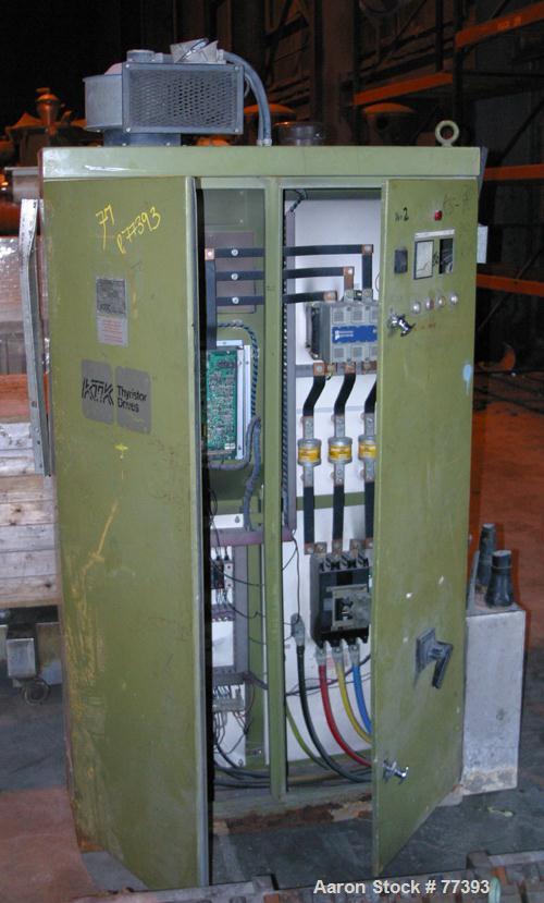 Used Dolci single screw extruder, model 120KR, 4.5" diameter screw x 160" long, 35:1 L/D ratio, 44" center line, 5 zone barrel, electrically heated, fan cooled, 8" diameter feed throat, side vented b...