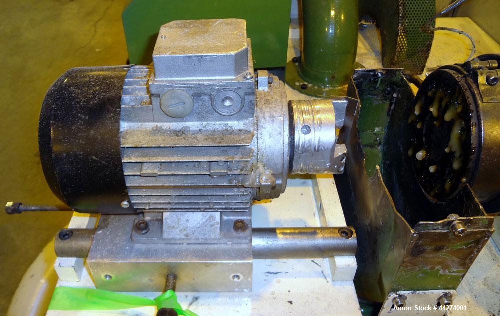 Used Macchi Recotrim Trim & Film Waste Pelletizing Line, Model ES40. Consisitng of: (1) 35mm Single screw extruder, approximate 19.2 L/D ratio. Electrically heated, air cooled 2 zone non-vented barre...