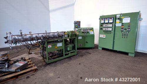 Used Twin Screw Pelletizing Line Consisting Of: (1) Berstorff 40mm twin screw extruder, model ZE40/40A, serial# EO6313/58. Co-Rotating Screw Design. Approximate 40 to 1 L/D ratio. 8 barrel sections, ...