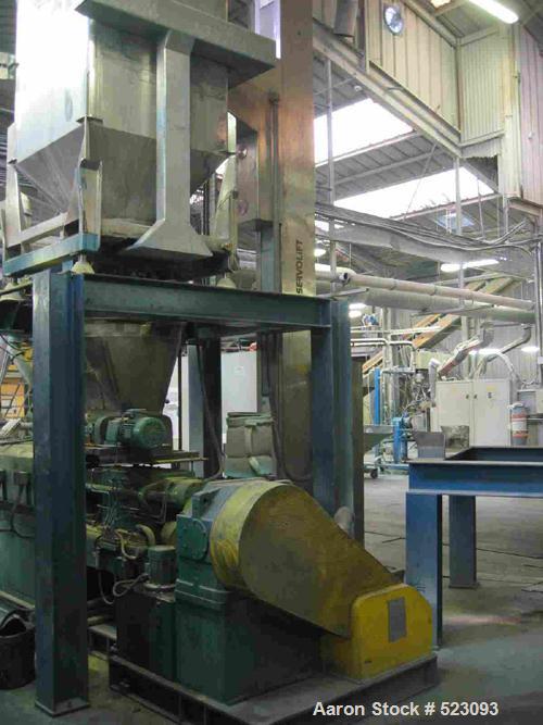 USED: Comac extrusion line. (1) Feeding system Matcon or Anag containers, servo lift Matcon (hydraulic lifting and positioning system), with 55 gallon (210 liter) Matcon buffer, screw feeder. (1) Com...