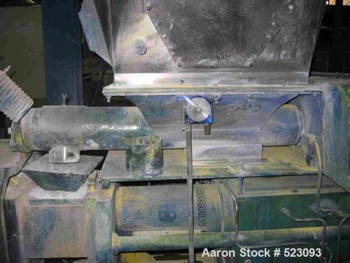 USED: Comac extrusion line. (1) Feeding system Matcon or Anag containers, servo lift Matcon (hydraulic lifting and positioning system), with 55 gallon (210 liter) Matcon buffer, screw feeder. (1) Com...