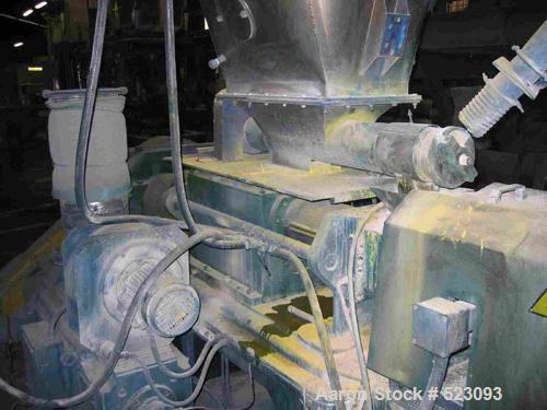 USED: Comac extrusion line. (1) Feeding system Matcon or Anag containers, servo lift Matcon (hydraulic lifting and positioning system), with 55 gallon (210 liter) Matcon buffer, screw feeder. (1) Com...