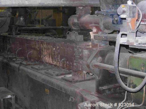 USED: Comac extrusion line. (1) Feeding system Matcon or Anag containers, servo lift Matcon (hydraulic lifting and positioning system), with 55 gallon (210 liter) Matcon buffer, screw feeder. (1) Com...
