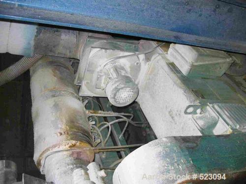 USED: Comac extrusion line. (1) Feeding system Matcon or Anag containers, servo lift Matcon (hydraulic lifting and positioning system), with 55 gallon (210 liter) Matcon buffer, screw feeder. (1) Com...