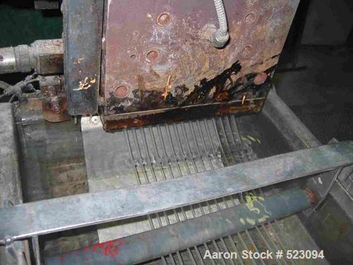 USED: Comac extrusion line. (1) Feeding system Matcon or Anag containers, servo lift Matcon (hydraulic lifting and positioning system), with 55 gallon (210 liter) Matcon buffer, screw feeder. (1) Com...
