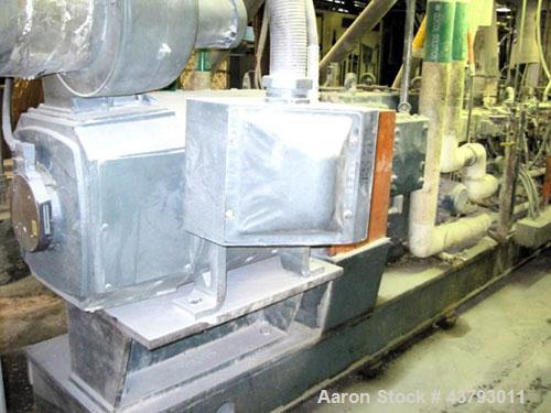 Used Werner & Pfleiderer 70mm Twin Screw Extruder, Type ZSK-70. Co-Rotating screw design. Approximate 52 to 1 L/D ratio. 300 hp motor, rpm 1750/1900, 500 volt, arm amps 473. Gear 12-2 x 1750 NM P-167...