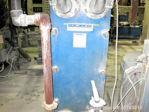 Used Werner & Pfleiderer 70mm Twin Screw Extruder, Type ZSK-70. Co-Rotating screw design. Approximate 52 to 1 L/D ratio. 300 hp motor, rpm 1750/1900, 500 volt, arm amps 473. Gear 12-2 x 1750 NM P-167...