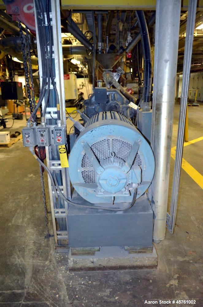 Used (1) ZSK-83 R240R 83mm Co-Rotating twin screw extruder, approximate 40 to 1 L/D ratio, serial# 218971, works# 507860-861, built 1985. (10) Barrel sections with (1) feed with hopper, (2) top vente...