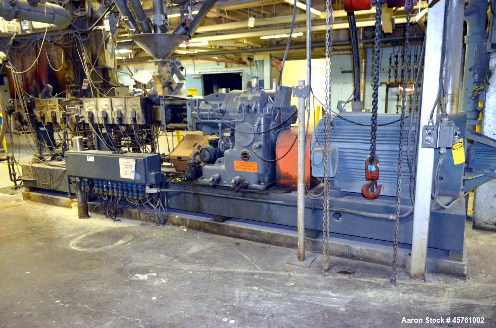 Used (1) ZSK-83 R240R 83mm Co-Rotating twin screw extruder, approximate 40 to 1 L/D ratio, serial# 218971, works# 507860-861, built 1985. (10) Barrel sections with (1) feed with hopper, (2) top vente...