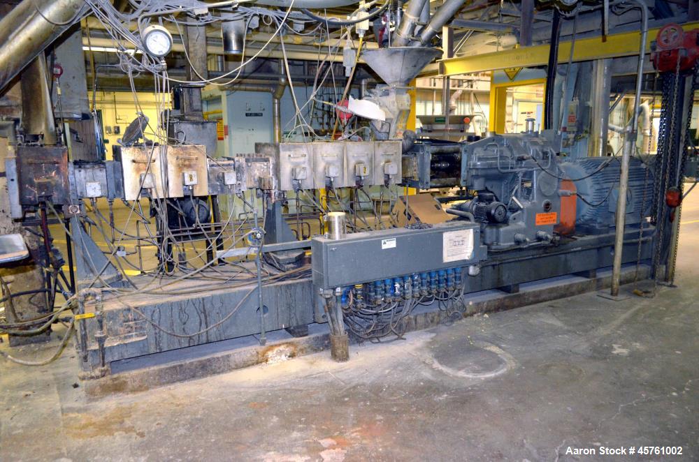 Used (1) ZSK-83 R240R 83mm Co-Rotating twin screw extruder, approximate 40 to 1 L/D ratio, serial# 218971, works# 507860-861, built 1985. (10) Barrel sections with (1) feed with hopper, (2) top vente...
