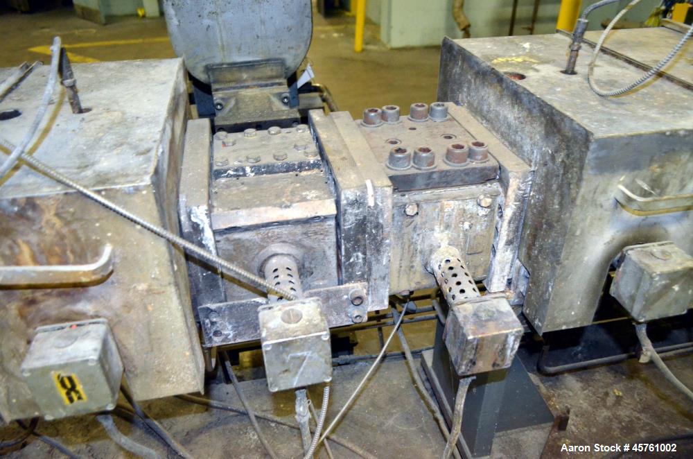 Used (1) ZSK-83 R240R 83mm Co-Rotating twin screw extruder, approximate 40 to 1 L/D ratio, serial# 218971, works# 507860-861, built 1985. (10) Barrel sections with (1) feed with hopper, (2) top vente...