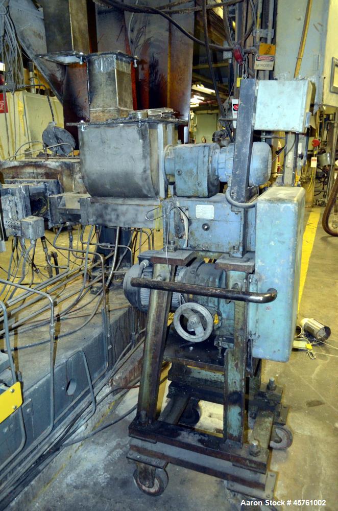 Used (1) ZSK-83 R240R 83mm Co-Rotating twin screw extruder, approximate 40 to 1 L/D ratio, serial# 218971, works# 507860-861, built 1985. (10) Barrel sections with (1) feed with hopper, (2) top vente...