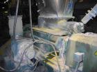 USED: Comac extrusion line. (1) Feeding system Matcon or Anag containers, servo lift Matcon (hydraulic lifting and positioning system), with 55 gallon (210 liter) Matcon buffer, screw feeder. (1) Com...