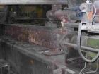 USED: Comac extrusion line. (1) Feeding system Matcon or Anag containers, servo lift Matcon (hydraulic lifting and positioning system), with 55 gallon (210 liter) Matcon buffer, screw feeder. (1) Com...
