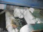 USED: Comac extrusion line. (1) Feeding system Matcon or Anag containers, servo lift Matcon (hydraulic lifting and positioning system), with 55 gallon (210 liter) Matcon buffer, screw feeder. (1) Com...