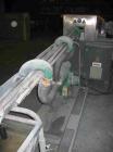 USED: Comac extrusion line. (1) Feeding system Matcon or Anag containers, servo lift Matcon (hydraulic lifting and positioning system), with 55 gallon (210 liter) Matcon buffer, screw feeder. (1) Com...