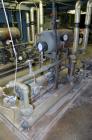 Used (1) ZSK-83 R240R 83mm Co-Rotating twin screw extruder, approximate 40 to 1 L/D ratio, serial# 218971, works# 507860-861, built 1985. (10) Barrel sections with (1) feed with hopper, (2) top vente...