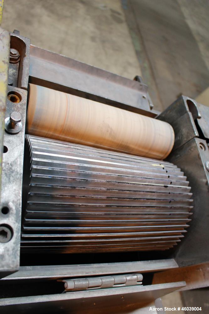 Used Conair Jetro Pelletizer, Model 212. Approximate 12" wide x 8" diameter 48 blade helical rotor. (1) Rubber, (1) metal pneumatically adjustable pull rolls. Driven by a 15hp, 500 volt, 1750 rpm DC ...