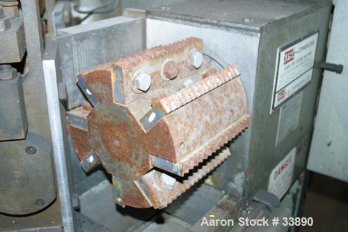USED:USI Cumberland stair step dicer, model 3 1/2. (1) 6-1/2" wide, 8 bolt-on ratchet tooth blade rotor. Manually adjustable notched metal pull rolls. 48" feed height. Driven by a 4 hp, 3/50/380/420 ...