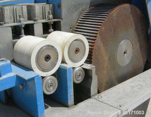 Used Accrapak Systems model 750/2 micro strand pelletizer.  Approximate 12" diameter rotor x 3 1/2" wide 120 knife helical rotor.  Dual sets of pneumatically adjustable pull rolls.  Driven by a 1.1 k...