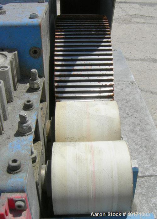 Used Accrapak Systems model 750/2 micro strand pelletizer.  Approximate 12" diameter rotor x 3 1/2" wide 120 knife helical rotor.  Dual sets of pneumatically adjustable pull rolls.  Driven by a 1.1 k...