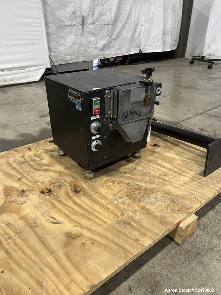 Used Brabender Lab Pelletizer, Type 7 12-74-000, 1"wide x 3-1/2" diamter cutting wheel, Approximately (20) 1/8"thick x 1/2" wide blades. Approximate 1"wide x 3/4" tall  infeed, 2" long x 1/2" wide bo...