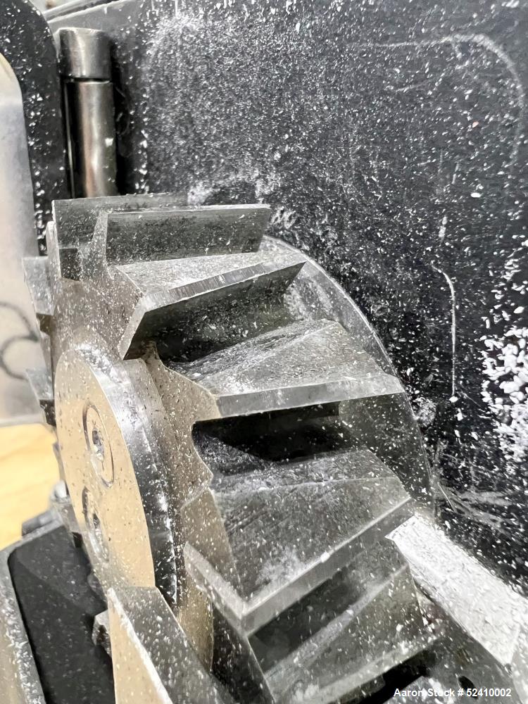 Used Brabender Lab Pelletizer, Type 7 12-74-000, 1"wide x 3-1/2" diamter cutting wheel, Approximately (20) 1/8"thick x 1/2" wide blades. Approximate 1"wide x 3/4" tall  infeed, 2" long x 1/2" wide bo...