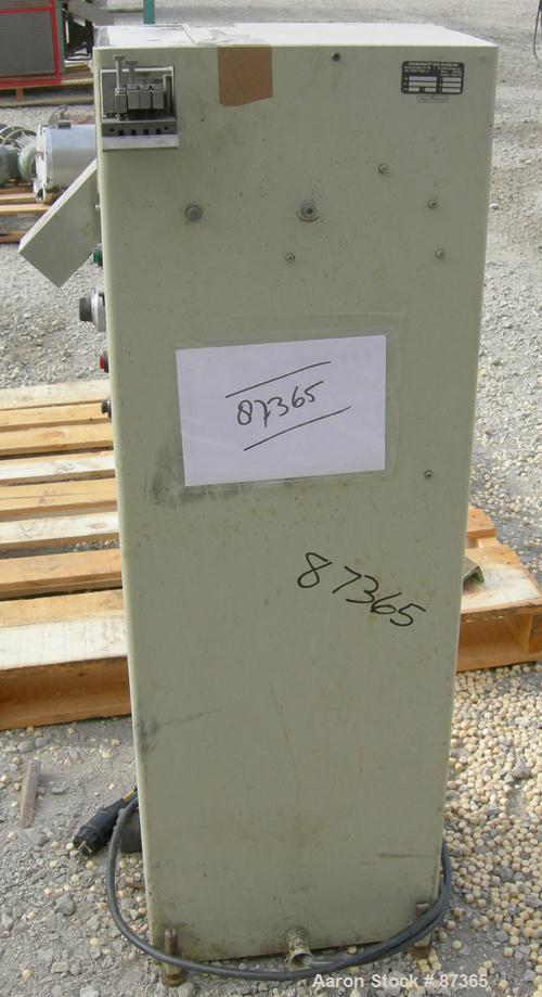 USED: Brabender 2" wide strand pelletizer, type 881203. Approximate 12 knife helical rotor. 50 hertz, 230 volt control. Spring adjustable tension, metal pull rolls. Mounted on a portable cart on whee...