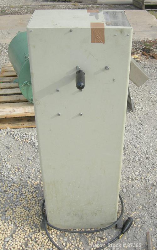 USED: Brabender 2" wide strand pelletizer, type 881203. Approximate 12 knife helical rotor. 50 hertz, 230 volt control. Spring adjustable tension, metal pull rolls. Mounted on a portable cart on whee...