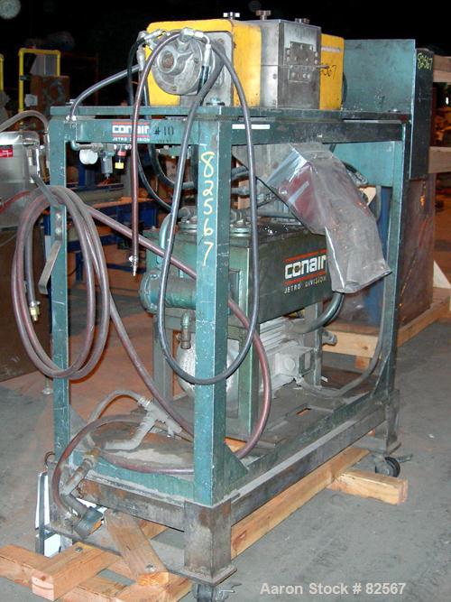 USED: Conair pelletizer, model 206. Approx 8" diameter x 6" wide 32 blade helical rotor. (1) Rubber and (1) metal pull roll. Hydraulically driven by a 10 hp, 3/60/460 volt power pack. Unit mounted on...