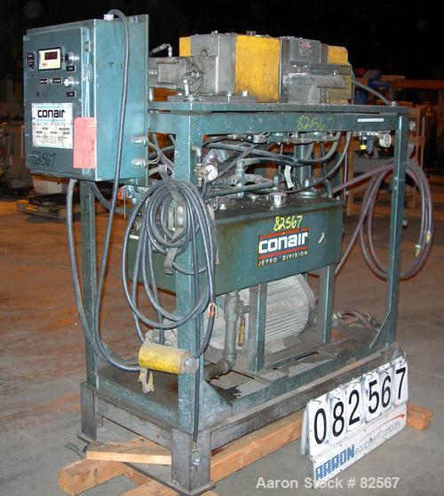USED: Conair pelletizer, model 206. Approx 8" diameter x 6" wide 32 blade helical rotor. (1) Rubber and (1) metal pull roll. Hydraulically driven by a 10 hp, 3/60/460 volt power pack. Unit mounted on...