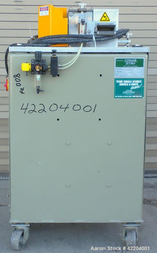 Used Conair Jetro Pelletizer, Model 304. Approximate 4" diameter x 4" wide 36 blade helical rotor. (1) Rubber, (1) metal pneumatically adjustable pull roll. Driven by a 2 hp, 180 volt, 1750 rpm DC mo...