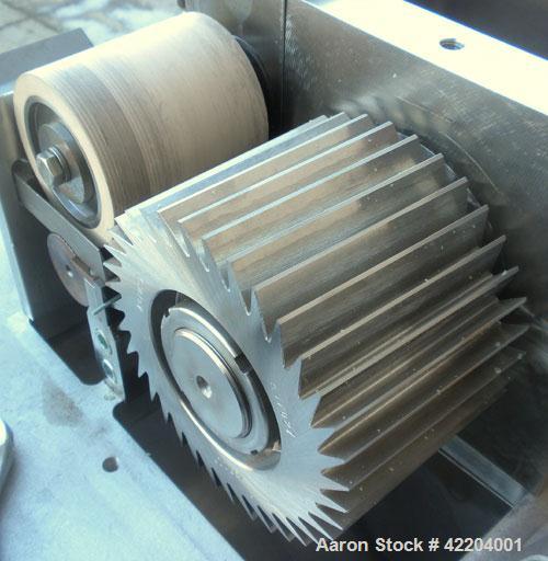 Used Conair Jetro Pelletizer, Model 304. Approximate 4" diameter x 4" wide 36 blade helical rotor. (1) Rubber, (1) metal pneumatically adjustable pull roll. Driven by a 2 hp, 180 volt, 1750 rpm DC mo...