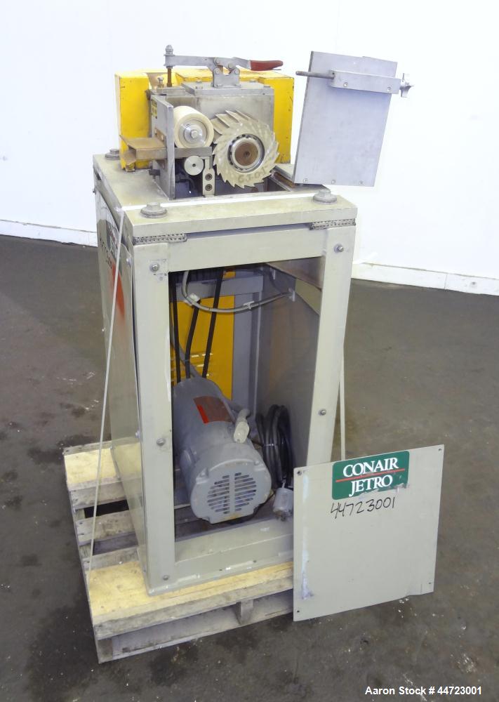 Used Conair Pelletizer, Model 304. Approximately 4" wide 20 blade rotor, (1) rubber, (1) metal pull roll.  Driven by a 2 hp, 180 volt, 1750/2050 rpm DC motor. Includes a CMC speed controller.  Unit m...
