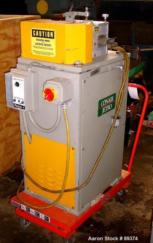 USED: Conair pelletizer, model 304. Approximately 4" wide x 20 blade helical rotor. Power feed roll with motor and VFD controller.