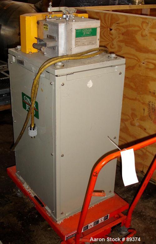 USED: Conair pelletizer, model 304. Approximately 4" wide x 20 blade helical rotor. Power feed roll with motor and VFD controller.