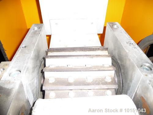 Used Conair Model T206GB Strand Pelletizer having a 6" entrance, sixteen knife rotor with removable blades. Pull rolls are driven by a 2 hp AC motor and the rotor is driven by a 5 hp AC motor. 460/3/...