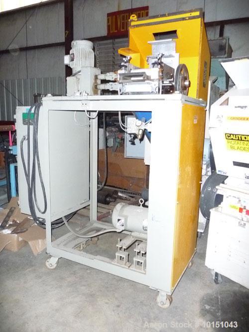 Used Conair Model T206GB Strand Pelletizer having a 6" entrance, sixteen knife rotor with removable blades. Pull rolls are driven by a 2 hp AC motor and the rotor is driven by a 5 hp AC motor. 460/3/...