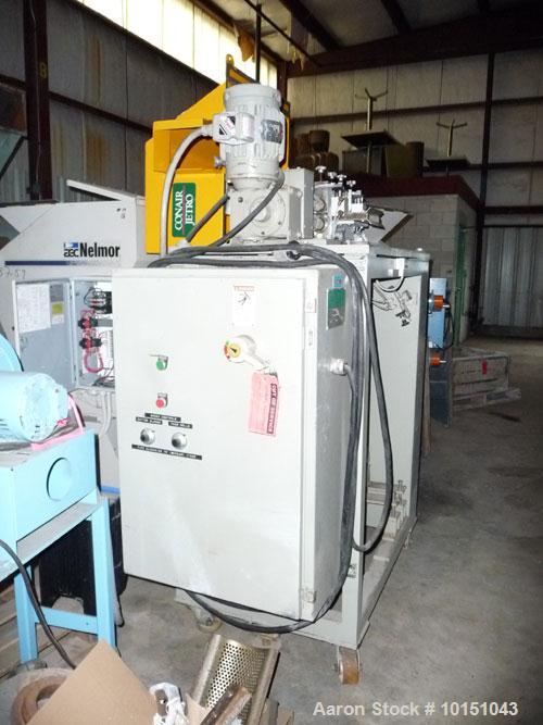 Used Conair Model T206GB Strand Pelletizer having a 6" entrance, sixteen knife rotor with removable blades. Pull rolls are driven by a 2 hp AC motor and the rotor is driven by a 5 hp AC motor. 460/3/...