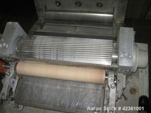 Used Cumberland Quietizer Pelletizer, Model 26. 26" wide 48 blade helical rotor. Air operated feed roll. Driven by a 50 hp, 3/60/460 volt motor. Includes a Reliance variable speed drive with run/jog ...
