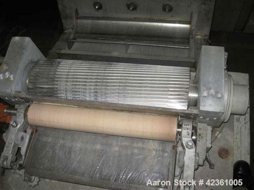 Used Cumberland Quietizer Pelletizer, Model 26. 26" wide 48 blade helical rotor. Air operated feed roll. Driven by a 50 hp, 3/60460 volt motor. Includes a Reliance variable speed drive with run/jog f...