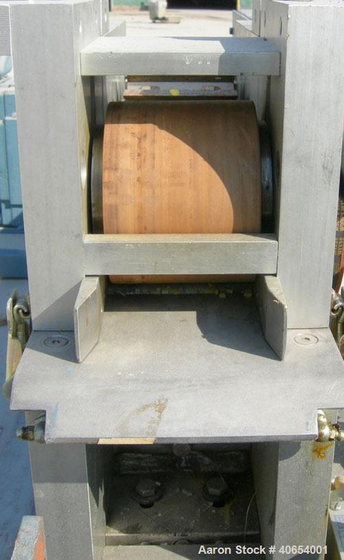 Used Cumberland 4 Utilizer Pelletizer. 3 1/2" wide 16 bolt on blade rotor, (1) rubber, (1) metal manually adjustable pull roll. Driven by a 2 hp, 180 volt, 1750 rpm DC motor. Includes a Reliance Mini...