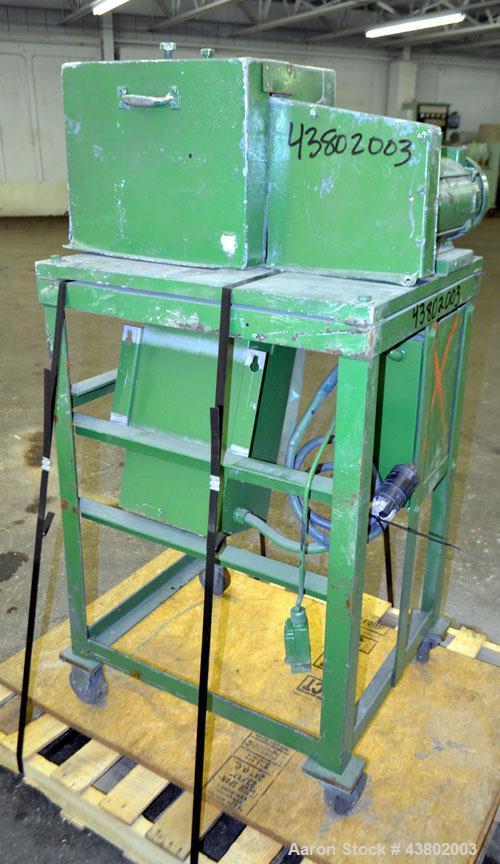 Used Cumberland Size 4 Pelletizer.  4” Wide x 8” diameter 16 bolt-on blade rotor, (1) rubber, (1) metal pull roll.  Driven by a 2 hp, 180 volt, 1750 rpm DC motor.  Unit mounted on a frame with caster...