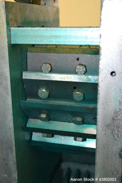 Used Cumberland Size 4 Pelletizer.  4” Wide x 8” diameter 16 bolt-on blade rotor, (1) rubber, (1) metal pull roll.  Driven by a 2 hp, 180 volt, 1750 rpm DC motor.  Unit mounted on a frame with caster...